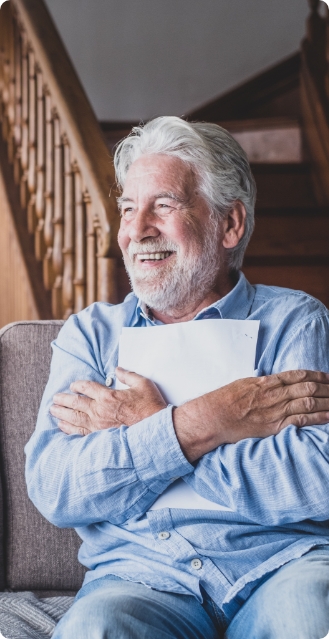 happy-elderly-man-reading
